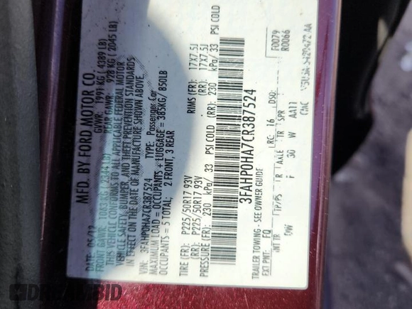 2012 Ford Fusion SE z VIN 3FAHP0HA7CR387524, wystawiony jako Copart lot #62083235 z przebiegiem 104 698 mil mil oraz Szkoda całkowita • Salvage title. Historia ofert i sprzedaży dostępna na DreamBid. Obrazek 12.