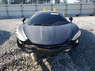 2021 McLaren GT z VIN SBM22GCA8MW001374, wystawiony jako Copart lot #82147064 z przebiegiem 32 562 mil mil oraz Nie do naprawy. Historia ofert i sprzedaży dostępna na DreamBid. Obrazek 5.
