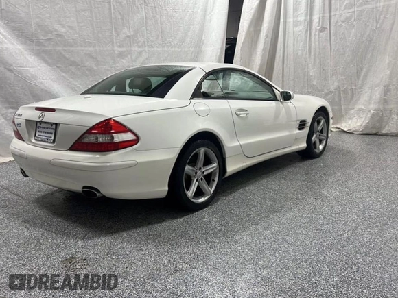 2007 Mercedes-Benz SL 550 with VIN WDBSK71FX7F129349, listed as a Copart auction lot 60161885 with 108,178 mi miles and Clean title. Bid and sale history available at DreamBid. Image 4.