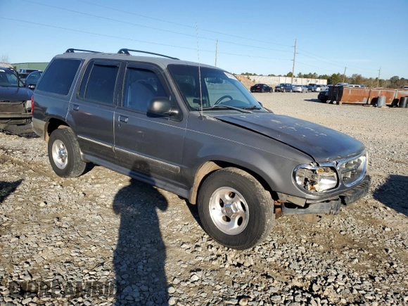 1999 Ford Explorer XL with VIN 1FMZU34X8XUC31019, listed as a Copart auction lot 87831635 with 220,683 mi miles and Salvage title. Bid and sale history available at DreamBid. Image 4.