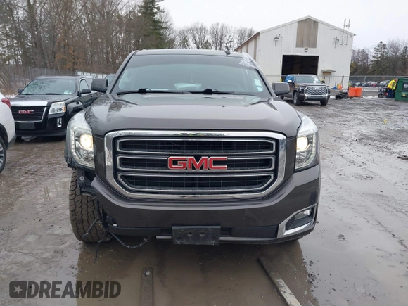 2019 GMC Yukon SLE with VIN 1GKS2AKC1KR385085, listed as a IAAI auction lot 41699370 with 83,889 mi miles. Bid and sale history available at carsss.com. Image 12.