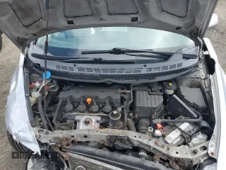 2009 Honda Civic LX z VIN 1HGFA16529L027844, wystawiony jako Copart lot #57383525 z przebiegiem 147 542 mil mil oraz Szkoda całkowita • Salvage title. Historia ofert i sprzedaży dostępna na DreamBid. Obrazek 11.
