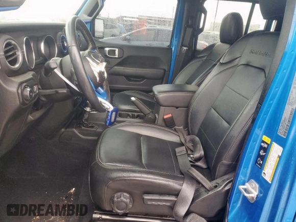 2023 Jeep Wrangler Sahara with VIN 1C4HJXEG7PW590252, listed as a Copart auction lot 59377765 with 32,689 mi miles and Salvage title. Bid and sale history available at DreamBid. Image 7.