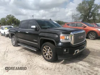 2015 GMC Sierra 1500 Denali z VIN 3GTP1WEC7FG202842, wystawiony jako IAAI lot #39691090 z przebiegiem 153 360 mil mil oraz . Historia ofert i sprzedaży dostępna na DreamBid. Obrazek 1.