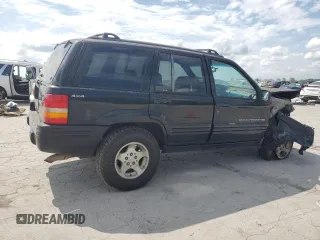 1998 Jeep Grand Cherokee Laredo with VIN 1J4GZ48S7WC222845, listed as a Copart auction lot 59576115 with Not provided miles and Clean title. Bid and sale history available at DreamBid. Image 3.