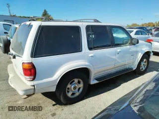 1999 Ford Explorer XLT with VIN 1FMZU34E8XZB27387, listed as a Copart auction lot 74398364 with 211,520 mi miles and Clean title. Bid and sale history available at DreamBid. Image 3.