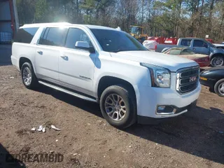 2016 GMC Yukon XL SLE with VIN 1GKS2FKC6GR458066, listed as a IAAI auction lot 41252794 with 168,606 mi miles. Bid and sale history available at carsss.com. Image 1.