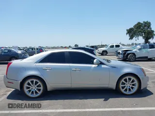 2008 Cadillac CTS RWD z VIN 1G6DV57V880153063, wystawiony jako IAAI lot #42440277 z przebiegiem 158 312 mil mil oraz . Historia ofert i sprzedaży dostępna na DreamBid. Obrazek 13.