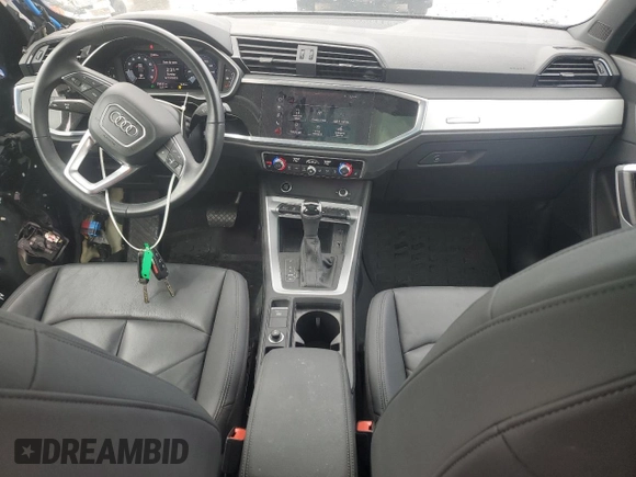 2021 Audi Q3 Premium with VIN WA1AUCF3XM1120717, listed as a Copart auction lot 54928885 with 25,833 mi miles and Salvage title. Bid and sale history available at DreamBid. Image 8.