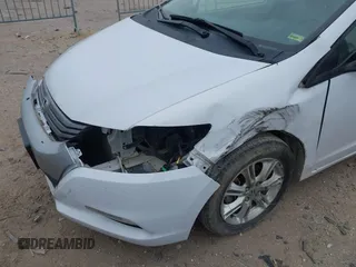2010 Honda Insight EX with VIN JHMZE2H71AS035091, listed as a IAAI auction lot 41380128 with 181,653 mi miles and . Bid and sale history available at DreamBid. Image 6.