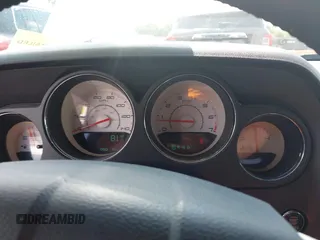 2013 Dodge Challenger SXT с VIN 2C3CDYAG7DH675121, выставлен на аукционе IAAI как лот 42623166 с пробегом 189 604 миль миль и . История ставок и продаж доступна на DreamBid. Изображение 16.