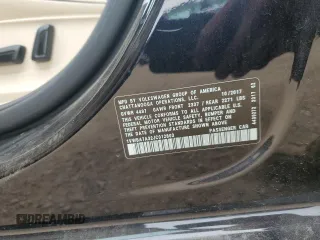 2018 Volkswagen Passat SE z VIN 1VWBA7A32JC012803, wystawiony jako Copart lot #57156055 z przebiegiem 95 710 mil mil oraz Szkoda całkowita • Salvage title. Historia ofert i sprzedaży dostępna na DreamBid. Obrazek 13.