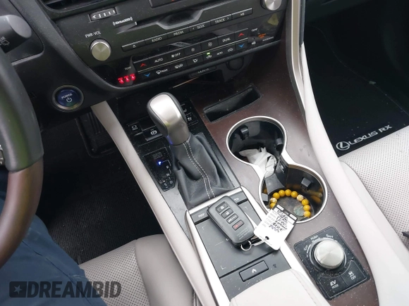 2022 Lexus RX 450h with VIN 2T2HGMDA7NC072735, listed as a IAAI auction lot 42356852 with 62,835 mi miles and . Bid and sale history available at DreamBid. Image 11.