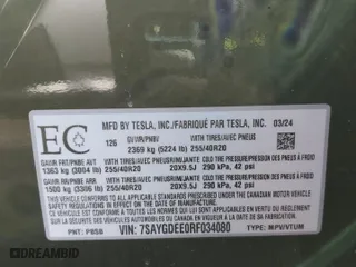 2024 Tesla Model Y Long Range with VIN 7SAYGDEE0RF034080, listed as a Copart auction lot 48329125 with 33,448 mi miles and Salvage Title. Bid and sale history available at carsss.com. Image 13.
