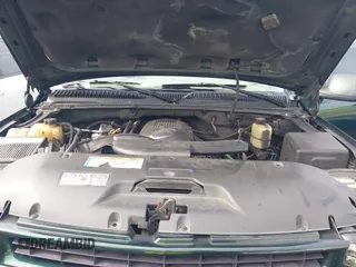2001 Chevrolet Suburban LS with VIN 3GNGK26U11G231007, listed as a IAAI auction lot 41452238 with 339,628 mi miles. Bid and sale history available at carsss.com. Image 10.