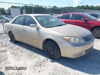 2004 Toyota Camry LE with VIN 4T1BE30K14U871156, listed as a IAAI auction lot 42576940 with 477,337 mi miles and . Bid and sale history available at DreamBid. Image 1.