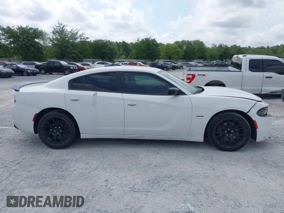2018 Dodge Charger R/T with VIN 2C3CDXCT4JH273914, listed as a IAAI auction lot 42124971 with 112,742 mi miles and . Bid and sale history available at DreamBid. Image 13.