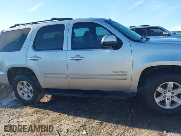 2013 GMC Yukon SLT with VIN 1GKS1CE04DR180881, listed as a IAAI auction lot 41647032 with 187,228 mi miles. Bid and sale history available at carsss.com. Image 13.