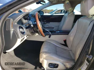2015 Jaguar XJ Portfolio with VIN SAJWJ2GD1F8V77420, listed as a Copart auction lot 81786334 with 129,190 mi miles and Salvage title. Bid and sale history available at DreamBid. Image 7.
