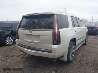 2015 Cadillac Escalade Premium with VIN 1GYS4CKJ0FR296009, listed as a IAAI auction lot 41168793 with 176,073 mi miles. Bid and sale history available at carsss.com. Image 4.
