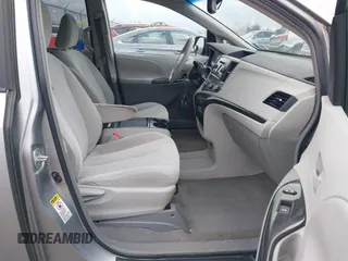 2011 Toyota Sienna LE AAS with VIN 5TDKK3DC8BS051934, listed as a IAAI auction lot 42040204 with 207,863 mi miles. Bid and sale history available at carsss.com. Image 5.