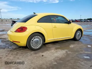 2014 Volkswagen Beetle 2.5L with VIN 3VWJX7AT2EM610372, listed as a Copart auction lot 60163345 with 121,497 mi miles and Salvage title. Bid and sale history available at DreamBid. Image 3.