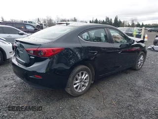 2015 Mazda 3 i Grand Touring with VIN JM1BM1W77F1230211, listed as a IAAI auction lot 41460344 with 106,544 mi miles and . Bid and sale history available at DreamBid. Image 4.