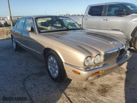 1998 Jaguar XJ with VIN SAJHX1247WC825160, listed as a Copart auction lot 74563884 with 0 mi miles and Non Repairable. Bid and sale history available at carsss.com. Image 4.