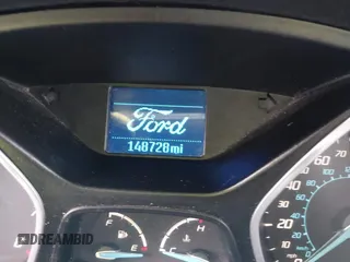 2012 Ford Focus SE z VIN 1FAHP3F29CL442731, wystawiony jako IAAI lot #42517796 z przebiegiem 148 728 mil mil oraz . Historia ofert i sprzedaży dostępna na DreamBid. Obrazek 15.