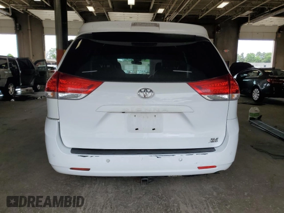 2013 Toyota Sienna XLE with VIN 5TDDK3DC9DS070424, listed as a Copart auction lot 61406715 with 193,583 mi miles and Salvage title. Bid and sale history available at DreamBid. Image 6.