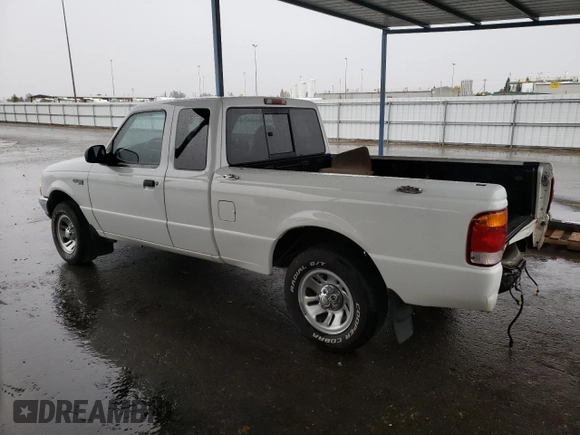 1999 Ford Ranger XLT with VIN 1FTYR14X3XPB21905, listed as a Copart auction lot 82248924 with 273,376 mi miles and Salvage Title. Bid and sale history available at DreamBid. Image 2.
