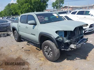 2023 Toyota Tacoma SR with VIN 3TMCZ5AN6PM567475, listed as a IAAI auction lot 42539738 with 54,660 mi miles and . Bid and sale history available at DreamBid. Image 1.