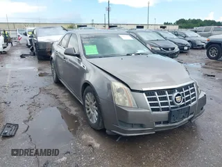 2012 Cadillac CTS Luxury with VIN 1G6DF5E59C0144185, listed as a IAAI auction lot 42605549 with 145,604 mi miles and . Bid and sale history available at DreamBid. Image 1.