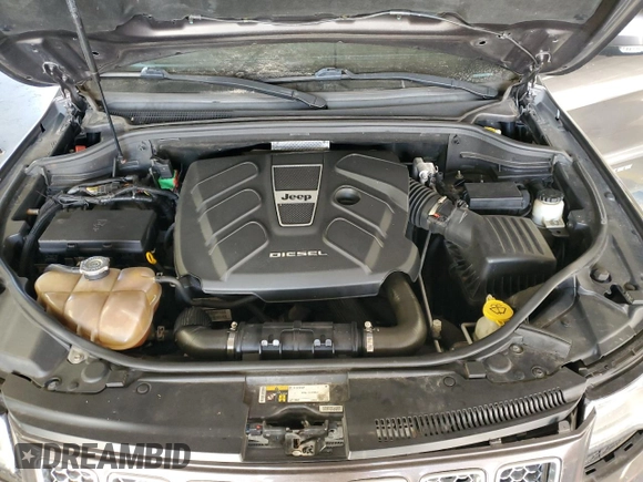 2015 Jeep Grand Cherokee Summit with VIN 1C4RJFJM9FC711776, listed as a Copart auction lot 84464454 with 94,637 mi miles and Salvage Title. Bid and sale history available at carsss.com. Image 12.
