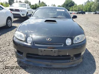 1997 Lexus SC 400 z VIN JT8CH32YXV0052087, wystawiony jako Copart lot #58088555 z przebiegiem 171 685 mil mil oraz Tytuł czysty. Historia ofert i sprzedaży dostępna na DreamBid. Obrazek 5.