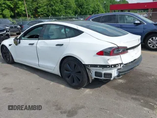 2022 Tesla Model S with VIN 5YJSA1E57NF462175, listed as a IAAI auction lot 42231439 with Not provided miles and . Bid and sale history available at DreamBid. Image 3.