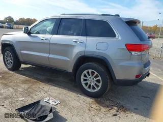 2014 Jeep Grand Cherokee Limited with VIN 1C4RJFBG4EC579551, listed as a IAAI auction lot 40656764 with 132,080 mi miles. Bid and sale history available at carsss.com. Image 3.