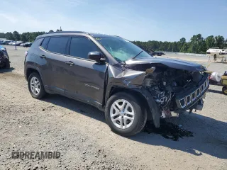 2018 Jeep Compass Sport with VIN 3C4NJCABXJT105430, listed as a Copart auction lot 59237575 with 104,600 mi miles and Salvage title. Bid and sale history available at DreamBid. Image 4.