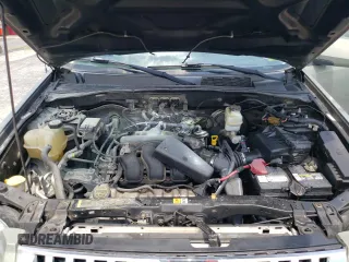 2008 Mercury Mariner Premier with VIN 4M2CU97178KJ45308, listed as a Copart auction lot 64947075 with 140,403 mi miles and Salvage title. Bid and sale history available at DreamBid. Image 12.