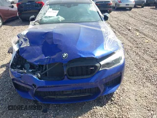 2018 BMW M5 z VIN WBSJF0C53JB282658, wystawiony jako IAAI lot #39977648 z przebiegiem 28 001 mil mil oraz . Historia ofert i sprzedaży dostępna na DreamBid. Obrazek 12.