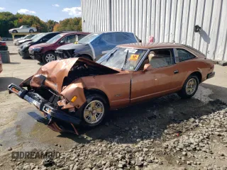 1981 Datsun 280ZX 2+2 z VIN JN1HZ06S6BX193317, wystawiony jako Copart lot #75494384 z przebiegiem 78 678 mil mil oraz Szkody całkowita. Historia ofert i sprzedaży dostępna na DreamBid. Obrazek 1.