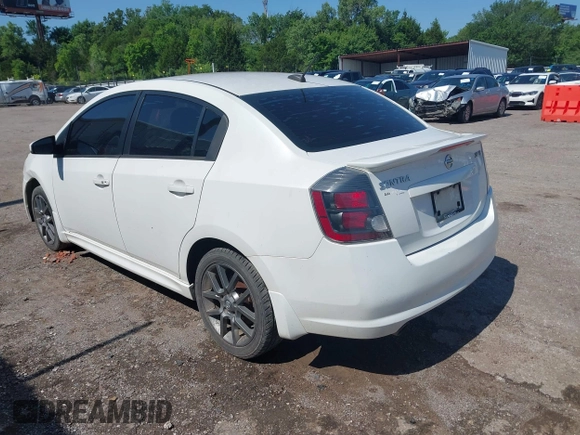 2012 Nissan Sentra SE-R z VIN 3N1BB6AP2CL670385, wystawiony jako IAAI lot #42431771 z przebiegiem 186 513 mil mil oraz . Historia ofert i sprzedaży dostępna na DreamBid. Obrazek 3.
