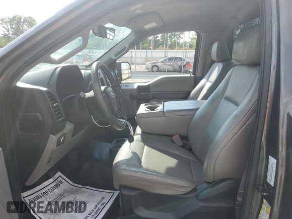 2017 Ford F-150 XL with VIN 1FTMF1C85HKE23681, listed as a Copart auction lot 64243075 with 105,163 mi miles and Clean title. Bid and sale history available at DreamBid. Image 7.