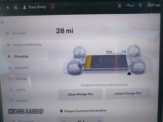 2015 Tesla Model S 85D with VIN 5YJSA1E28FF110066, listed as a IAAI auction lot 40672973 with 100,157 mi miles. Bid and sale history available at carsss.com. Image 18.