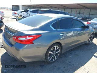2016 Nissan Altima SR with VIN 1N4AL3AP1GC285363, listed as a IAAI auction lot 41754598 with 121,923 mi miles and . Bid and sale history available at carsss.com. Image 4.