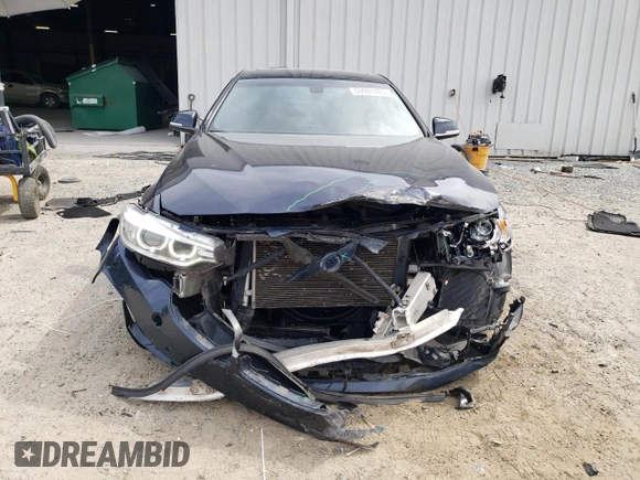 2016 BMW 4 Series 428i with VIN WBA3N7C52GK228544, listed as a Copart auction lot 53991705 with 103,218 mi miles and Salvage title. Bid and sale history available at DreamBid. Image 5.