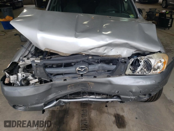 2001 Mazda Tribute LX with VIN 4F2CU08141KM65160, listed as a Copart auction lot 60895624 with 255,194 mi miles and Salvage Title. Bid and sale history available at DreamBid. Image 13.