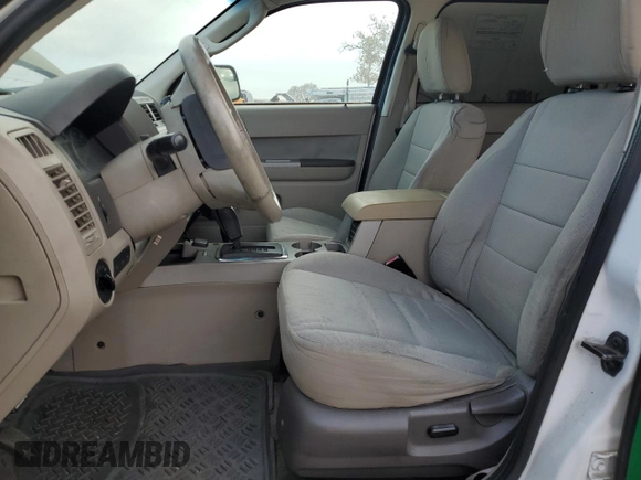 2010 Ford Escape Hybrid with VIN 1FMCU4K30AKC90709, listed as a Copart auction lot 85394774 with 183,092 mi miles and Salvage title. Bid and sale history available at DreamBid. Image 7.