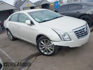2014 Cadillac XTS Luxury with VIN 2G61M5S3XE9185493, listed as a IAAI auction lot 41711302 with 89,725 mi miles. Bid and sale history available at carsss.com. Image 1.