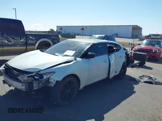 2018 Nissan Maxima SR with VIN 1N4AA6AP7JC407982, listed as a IAAI auction lot 41960196 with 63,969 mi miles. Bid and sale history available at carsss.com. Image 18.